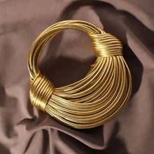 Gold luxury handwoven designer handbag for women 2024 collection