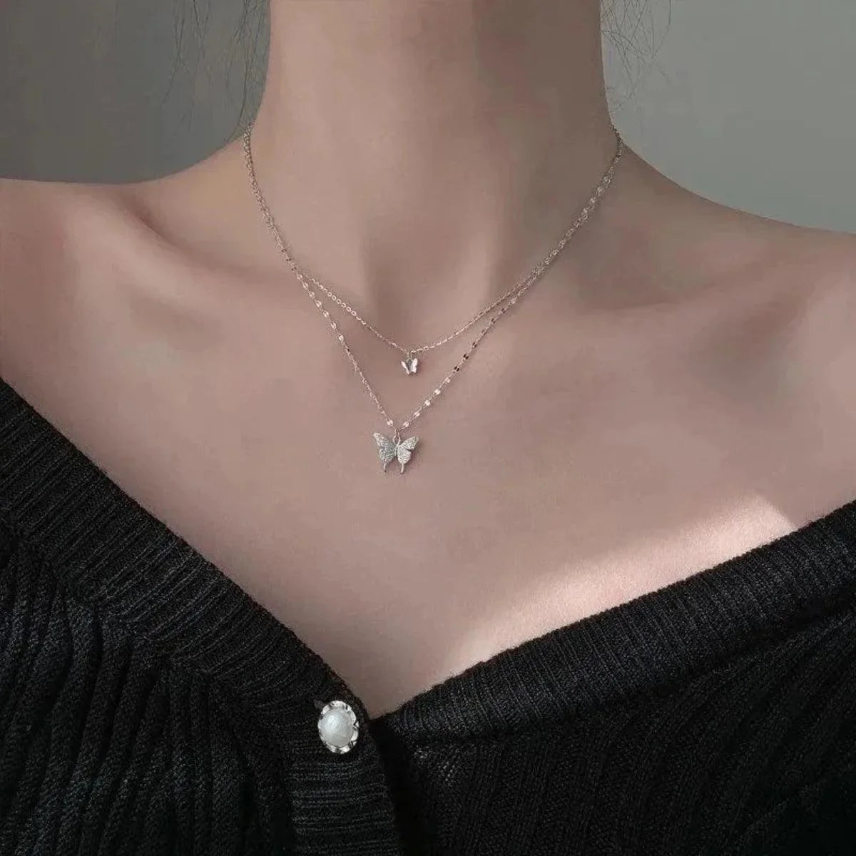 Women's double layer butterfly necklace with sparkling silver chain
