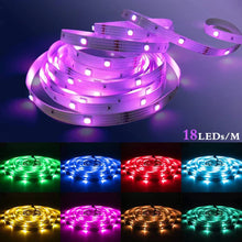 Bluetooth Control RGB Strip Lights glowing in a vibrant bedroom setup