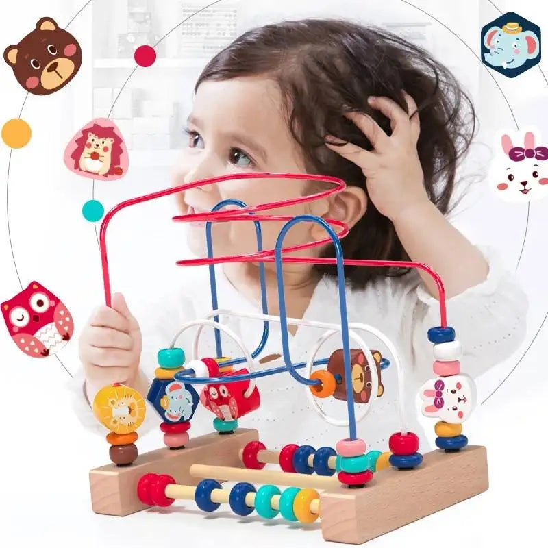 Toddler playing with Montessori wooden roller coaster bead maze toy

