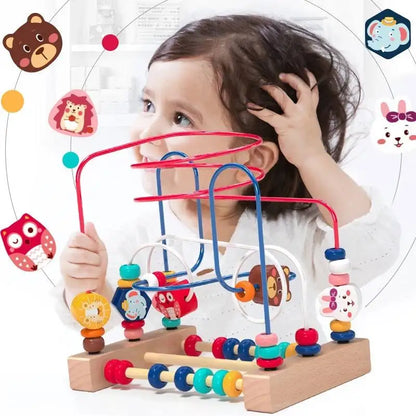Toddler playing with Montessori wooden roller coaster bead maze toy

