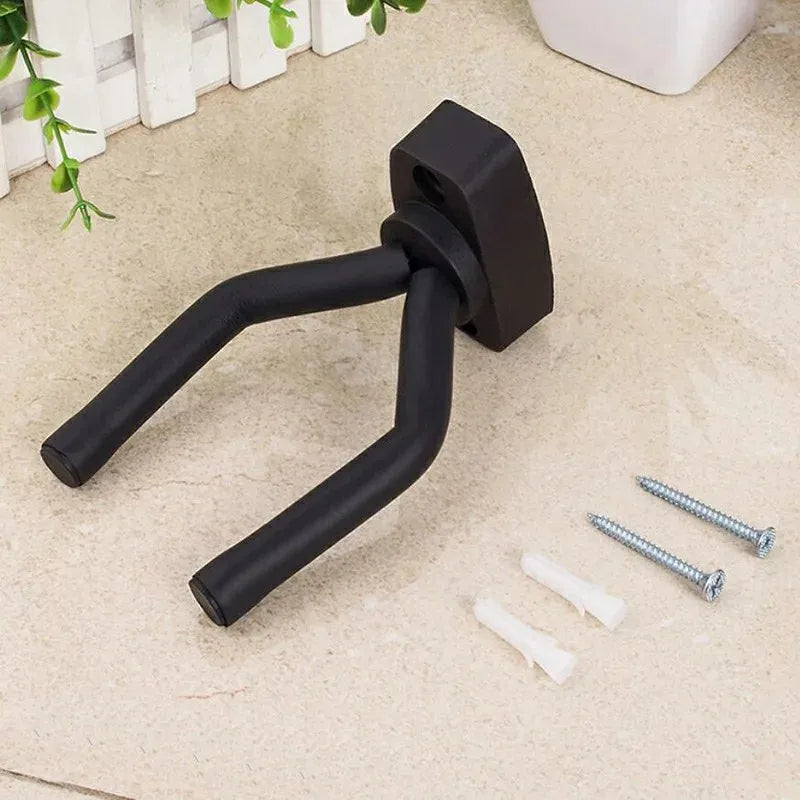 Heavy-duty guitar holder wall mount with padded hook for secure instrument display

