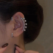 Silver color pearl ear cuff with faux pearl on a sleek silver-tone design