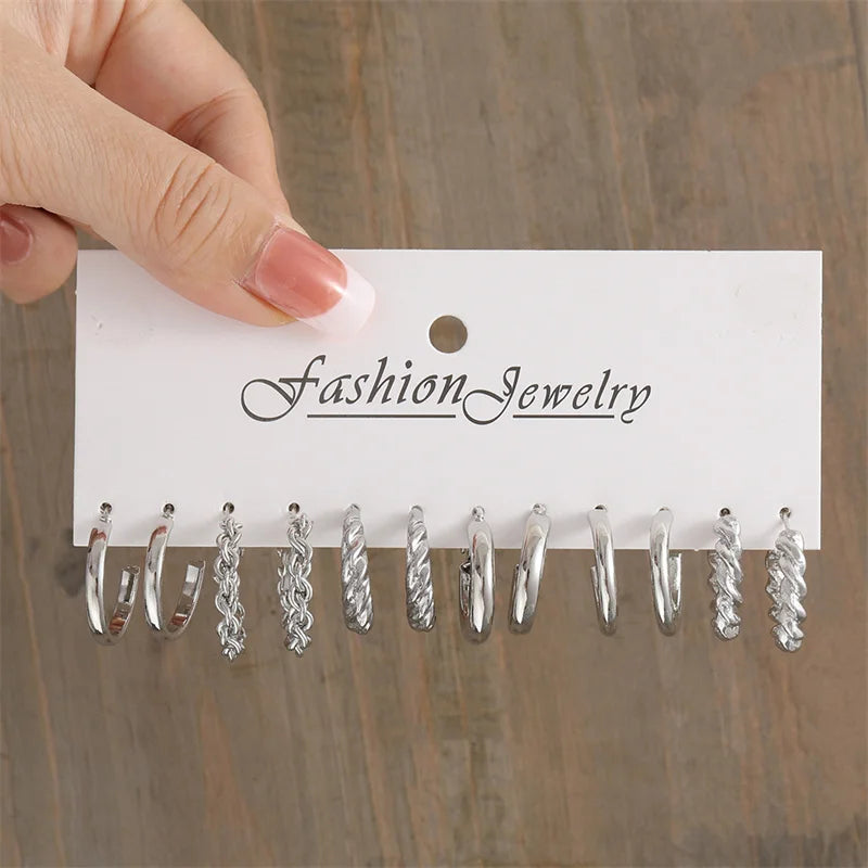 Close-up of elegant style hoop earrings with glossy finish and faux pearl accents