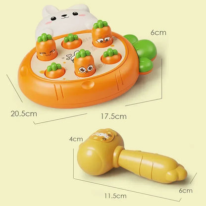 Toddler playing with ELMAS Montessori hammering toy with animal theme


