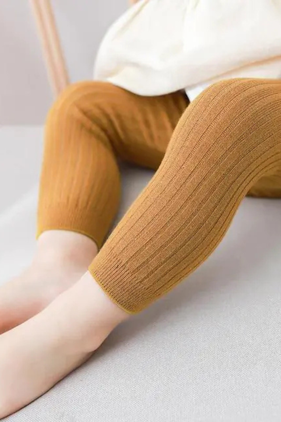 Soft cotton newborn baby pants for infants in pastel colors

