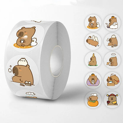 A roll of stickers featuring cute capybara illustrations in various playful poses, with a selection of the sticker designs displayed next to it.