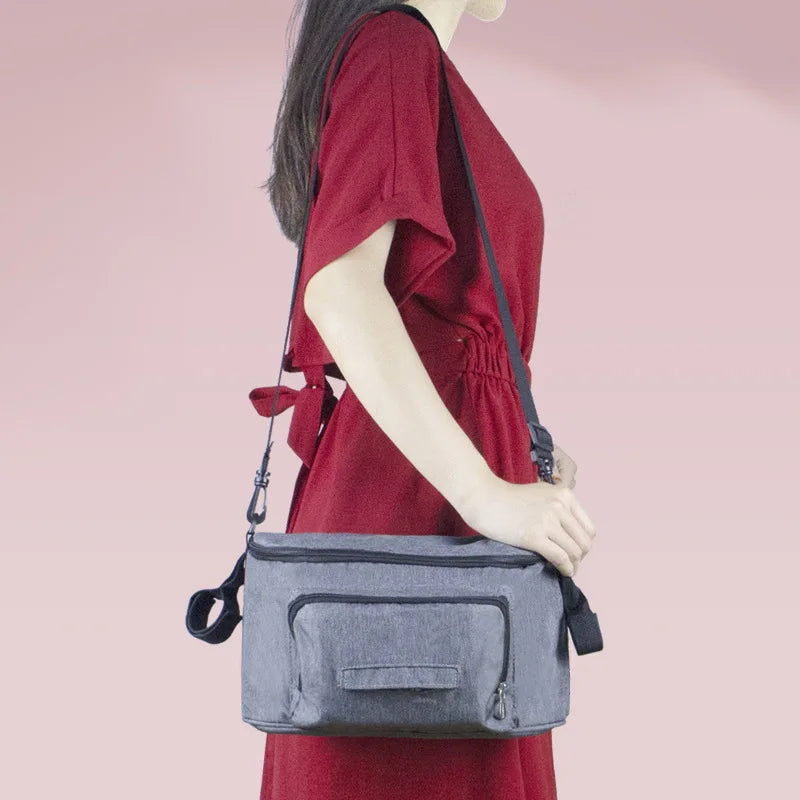 Waterproof diaper bag for moms with stroller straps and baby organizer

