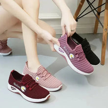 Woman wearing lightweight breathable casual sneakers outdoors

