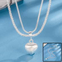 Women’s double layer heart pendant necklace with brushed finish