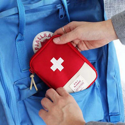 Mini first aid kit and portable medicine bag for travel, camping, and emergency use

