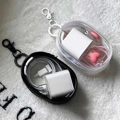 Clear round Data Cable Storage Box for travel and headset organization

