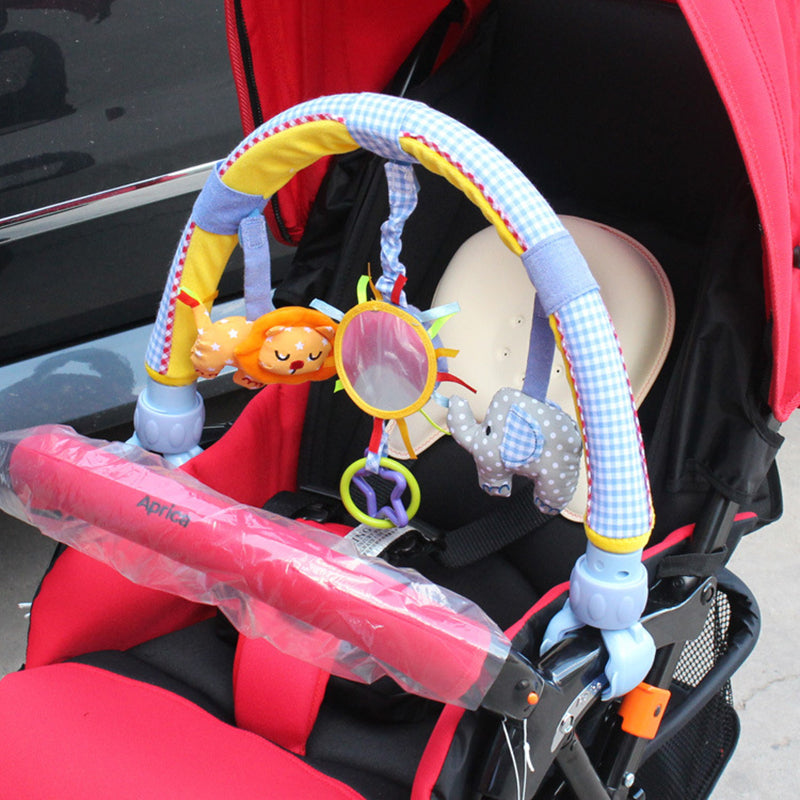 Baby stroller hanging toy with plush animal and clip for easy attachment


