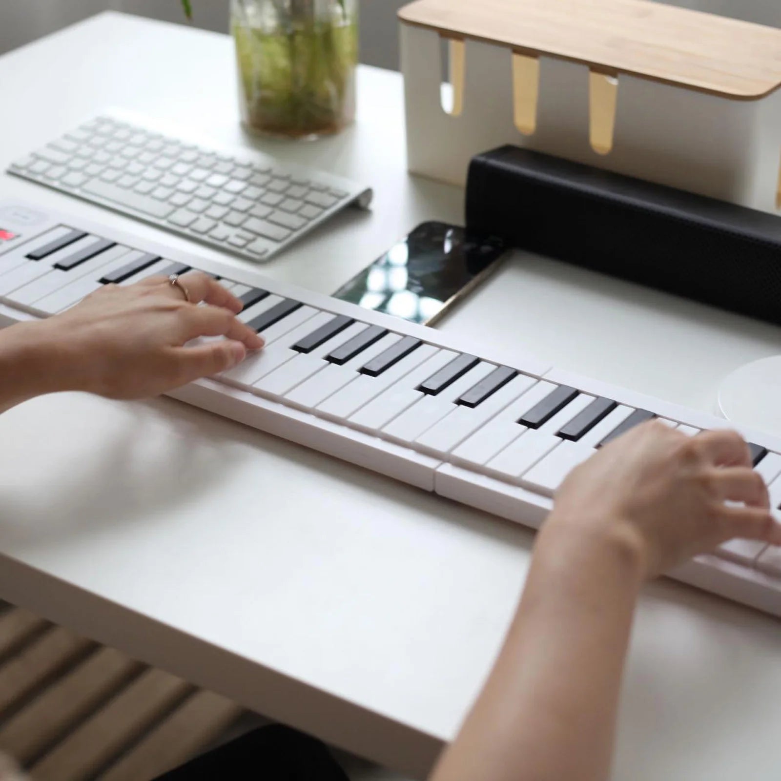 61-key foldable electronic piano with LED display and built-in battery for portable music practice

