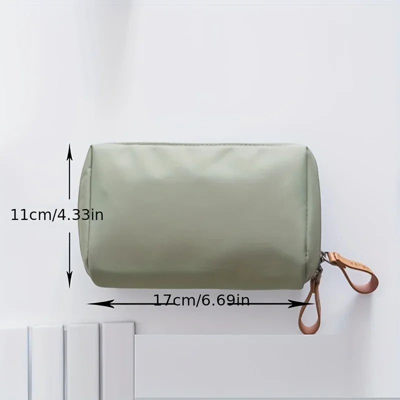 Portable makeup bag with solid color design for travel and daily cosmetic storage