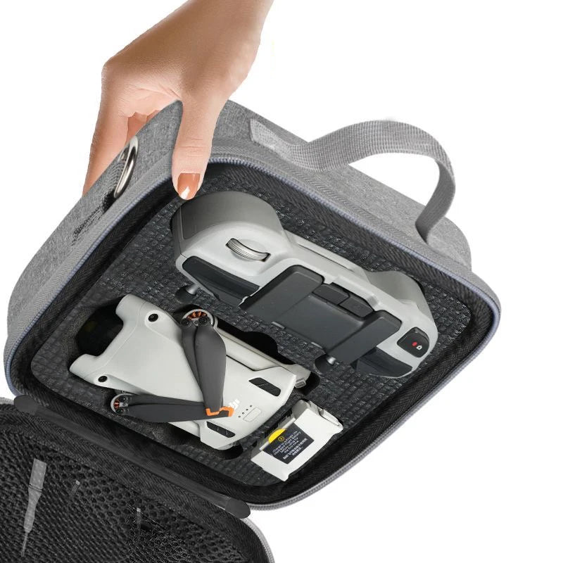 Gray DJI Mini 4 Pro carrying case with compartments for drone and RC-N2 controller

