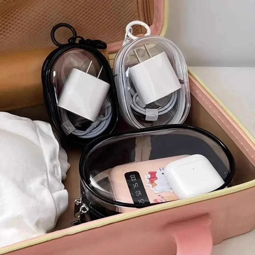 Clear round Data Cable Storage Box for travel and headset organization

