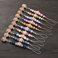 Baby pacifier chain with wooden pentagram teether and silicone beads for teething relief