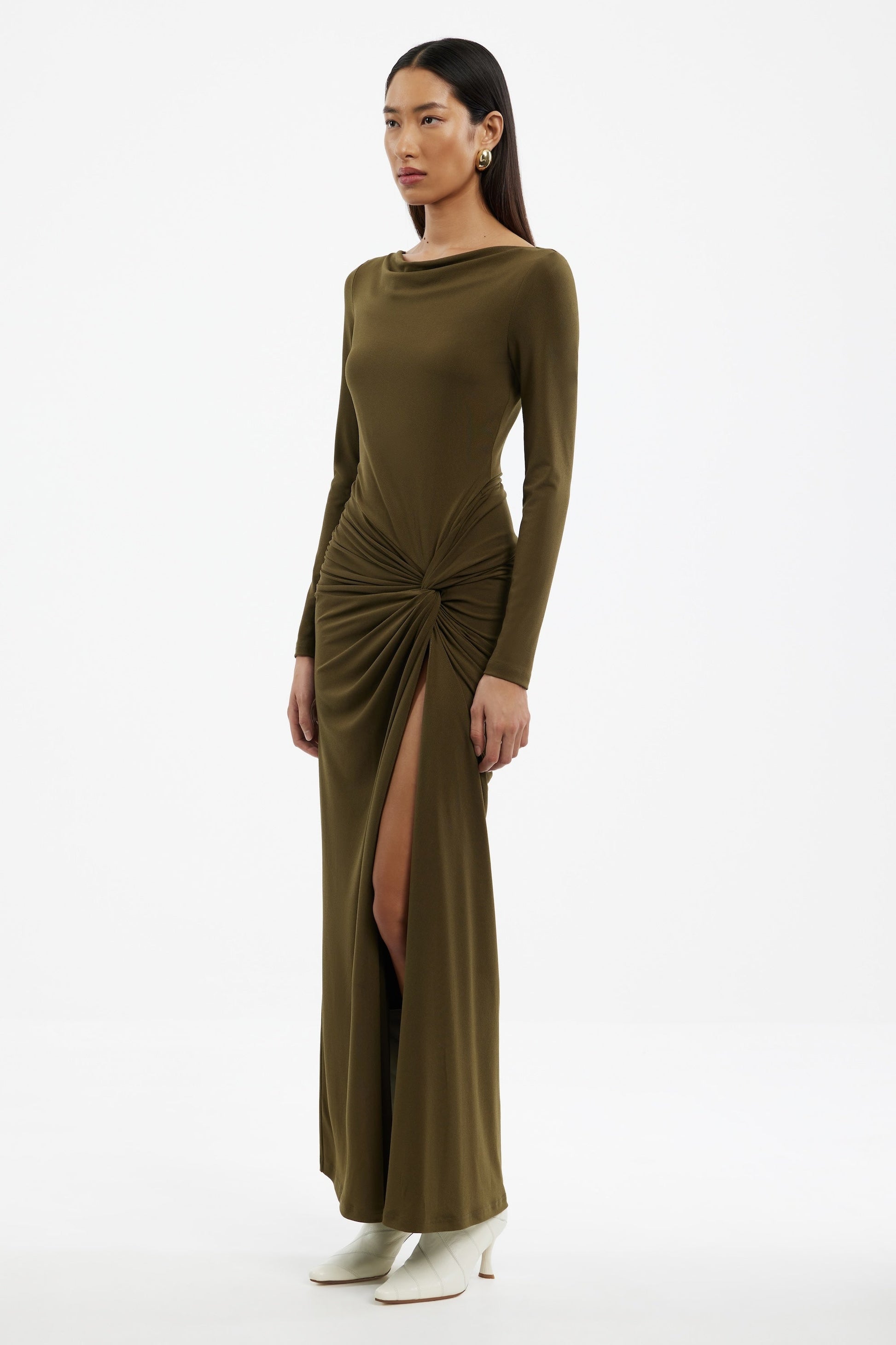 Woman wearing a Sarlyn long sleeve maxi dress with floral print, ideal for elegant casual and seasonal outfits.