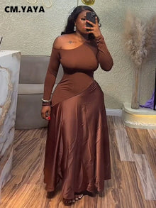 Woman in a one shoulder maxi dress with patchwork design, perfect for summer parties and evening events.
