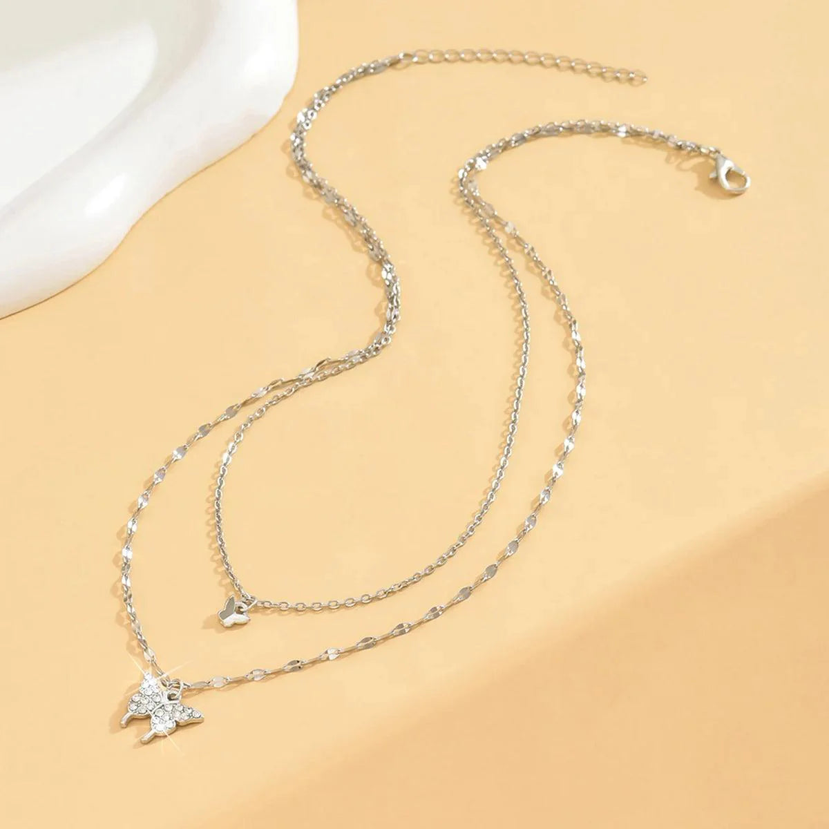 Women's double layer butterfly necklace with sparkling silver chain