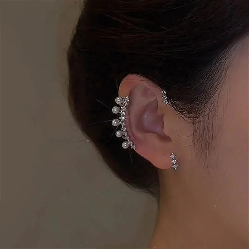 Silver color pearl ear cuff with faux pearl on a sleek silver-tone design