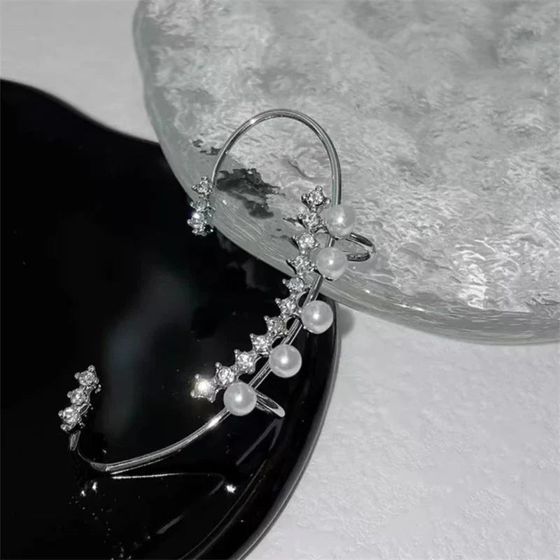Silver color pearl ear cuff with faux pearl on a sleek silver-tone design