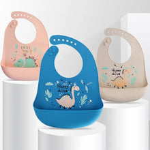 Waterproof baby bib with adjustable silicone strap and dinosaur print

