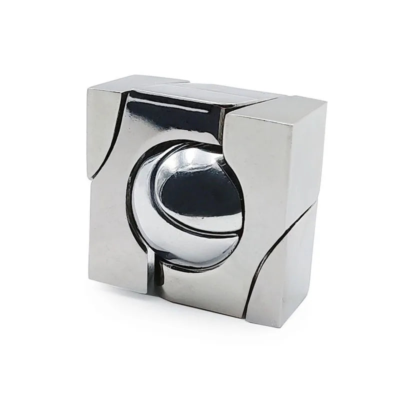 A metallic 3D puzzle toy with a spherical component centered within a geometric frame, likely made of steel or a similar metal.