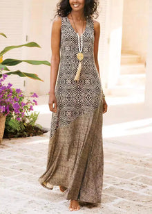 Woman in a French khaki V-neck maxi dress with patchwork print, perfect for summer casual and boho style.