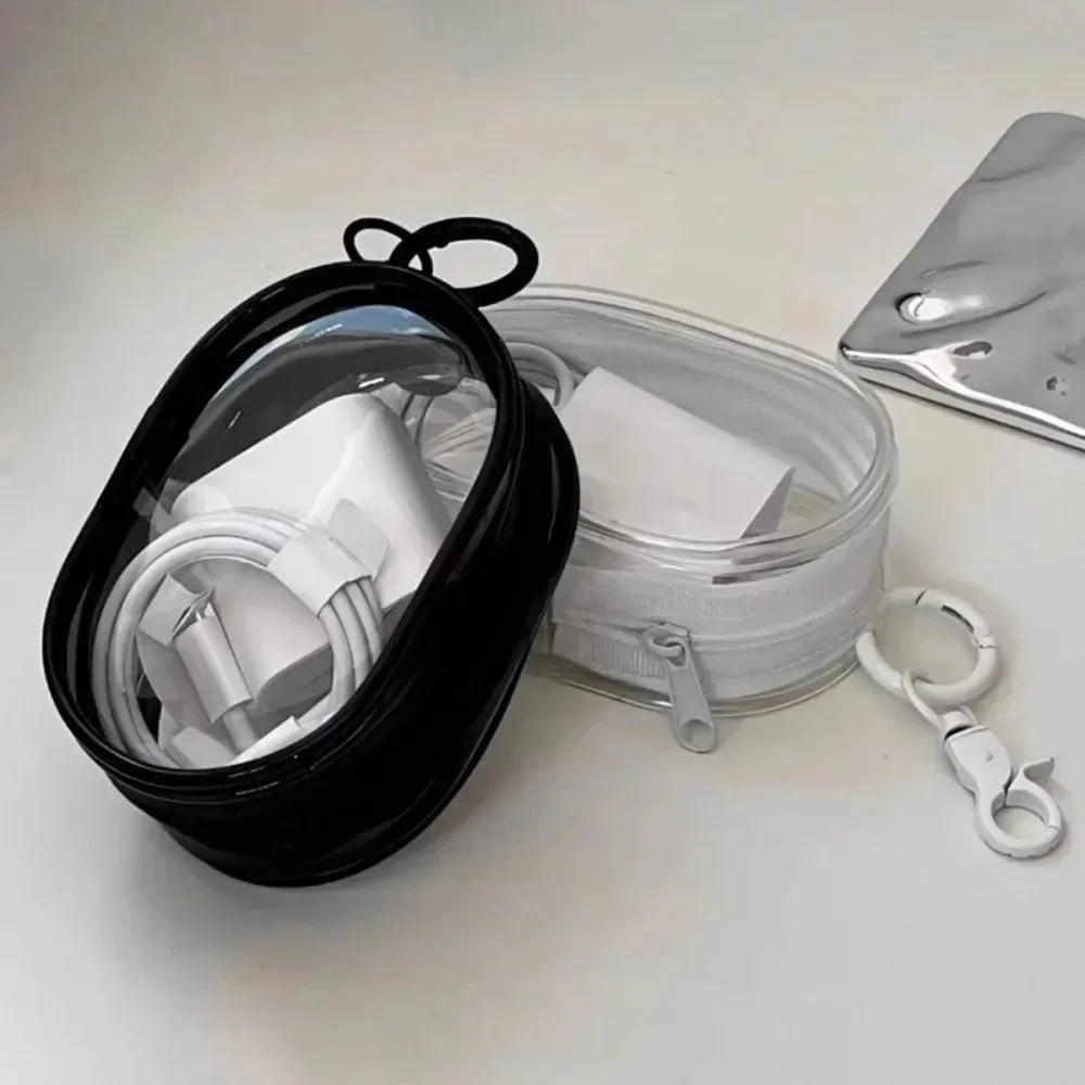 Clear round Data Cable Storage Box for travel and headset organization

