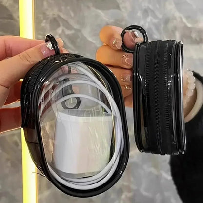 Clear round Data Cable Storage Box for travel and headset organization

