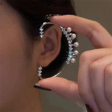Silver color pearl ear cuff with faux pearl on a sleek silver-tone design