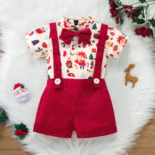 Newborn wearing festive bowtie Christmas romper with braces

