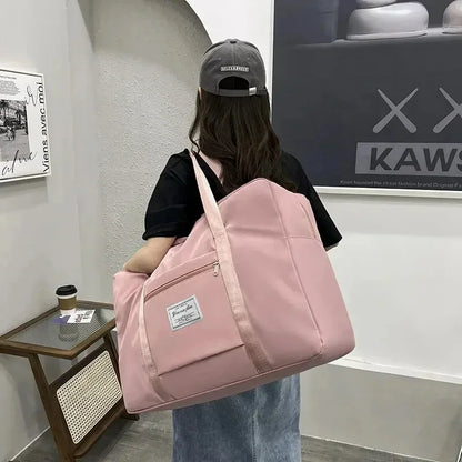 Large capacity travel bag with zipper and handles for gym, sports, and daily use