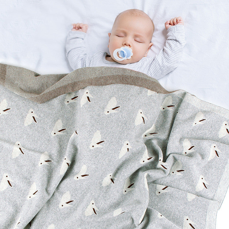 Cozy baby knitted blanket with bunny ears for warmth and wind protection


