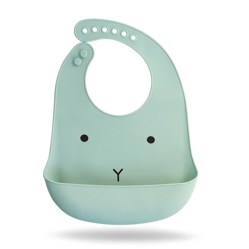 Waterproof baby bib with adjustable silicone strap and dinosaur print

