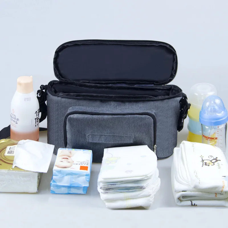 Waterproof diaper bag for moms with stroller straps and baby organizer

