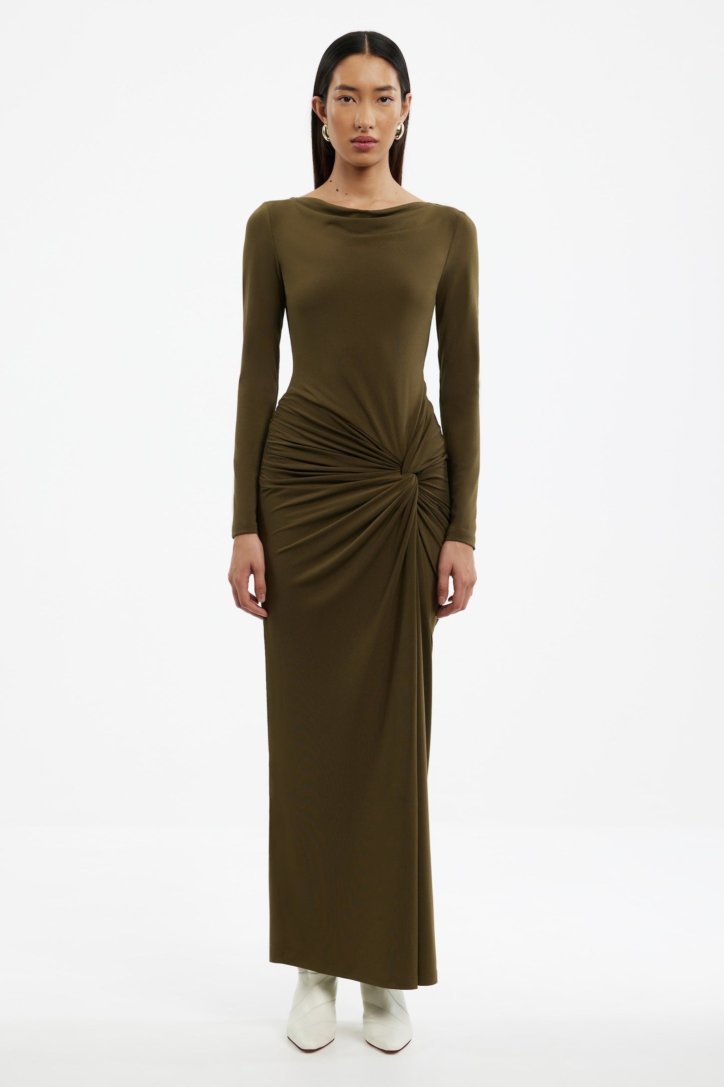 Woman wearing a Sarlyn long sleeve maxi dress with floral print, ideal for elegant casual and seasonal outfits.