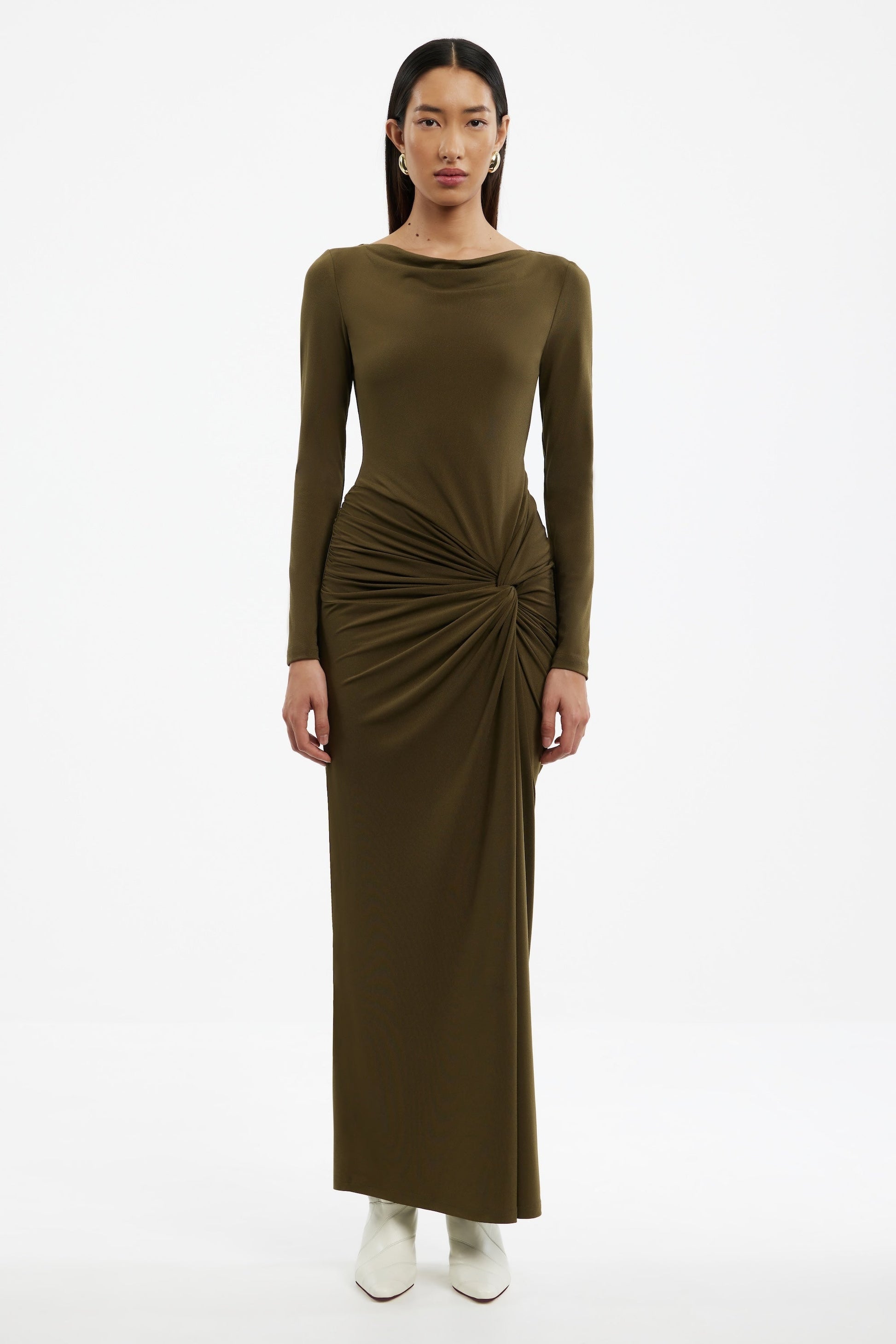Woman wearing a Sarlyn long sleeve maxi dress with floral print, ideal for elegant casual and seasonal outfits.