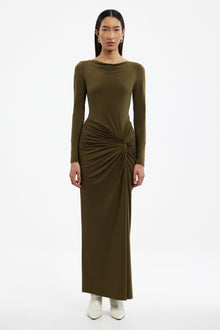Woman wearing a Sarlyn long sleeve maxi dress with floral print, ideal for elegant casual and seasonal outfits.