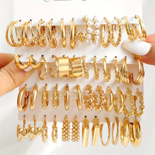 Close-up of elegant style hoop earrings with glossy finish and faux pearl accents
