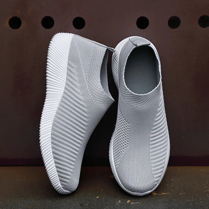 Women Vulcanized Shoes in black slip-on flats with cushioned insole for walking