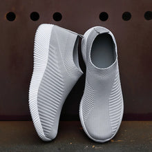Women Vulcanized Shoes in black slip-on flats with cushioned insole for walking