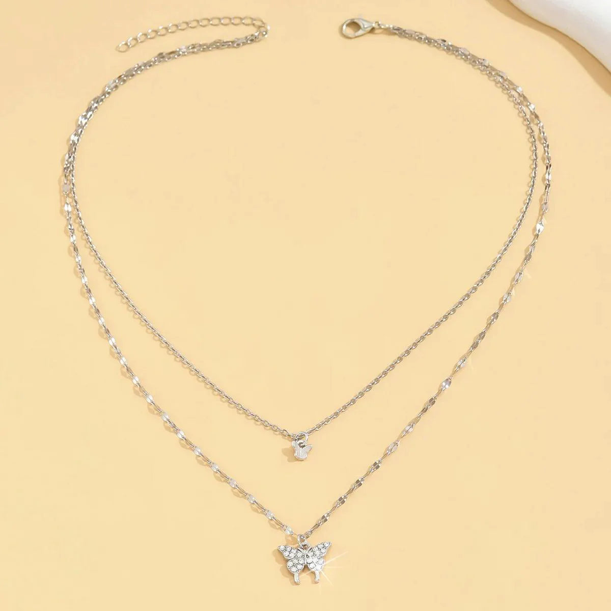 Women's double layer butterfly necklace with sparkling silver chain