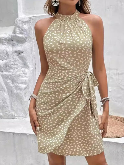 Woman wearing women's floral printed mini dresses at a sunny outdoor event