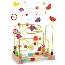 Toddler playing with Montessori wooden roller coaster bead maze toy

