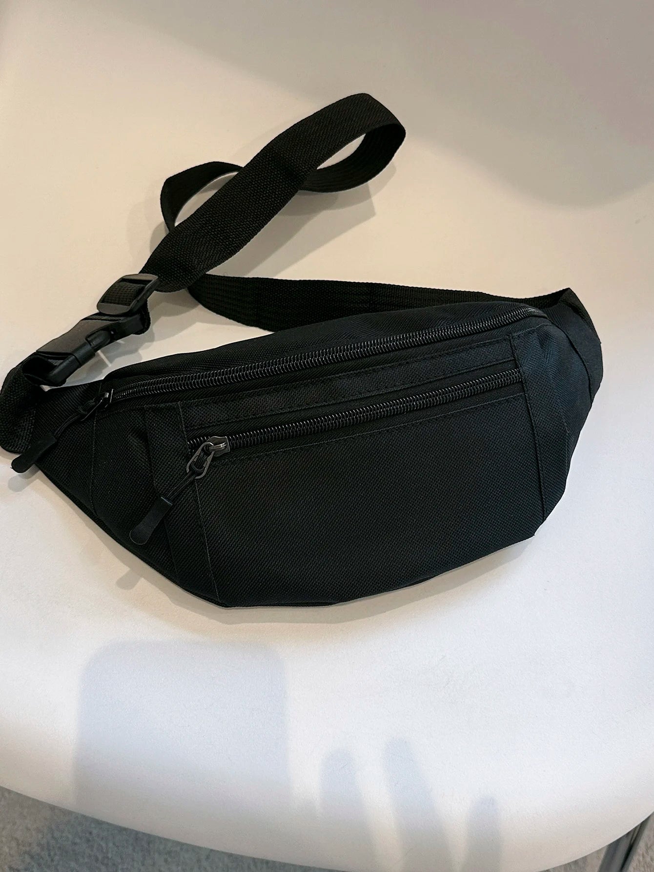 Sports fanny pack for running, travel, and workouts with phone and wallet storage